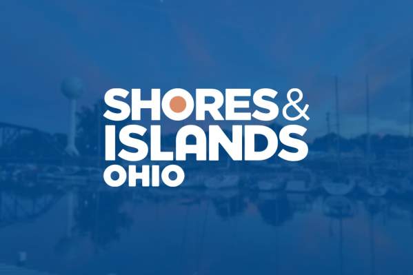 shores & Islands Ohio written over river with boats background covered in blue